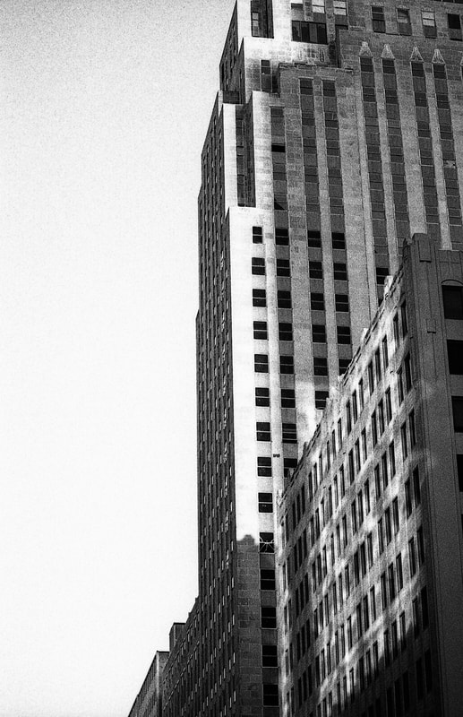 Light and Shadow in Downtown OKC. (Minolta 7000 and HP5+ pushed to 800 ISO)